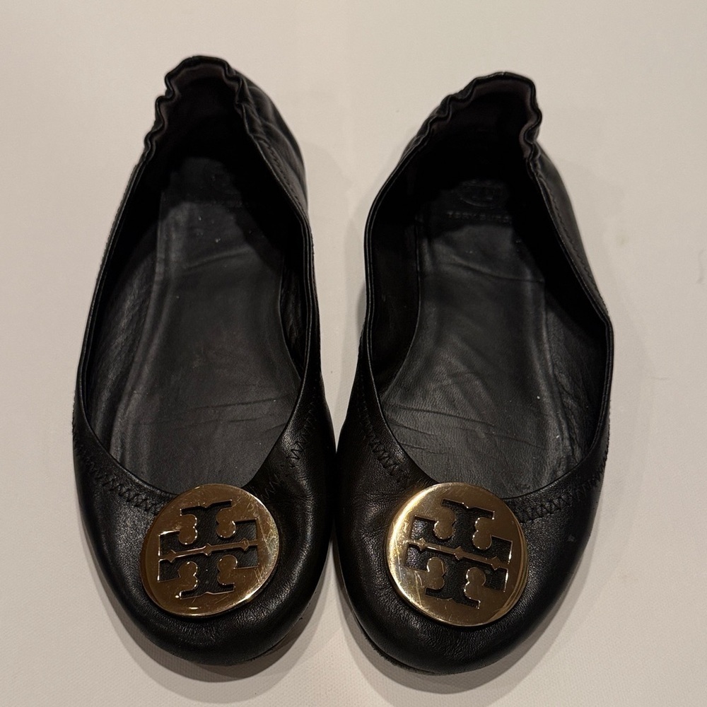 Tory Burch Black Flats with Gold Emblem